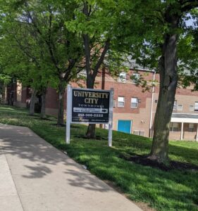 Picutre of a sign saying University City Townhomes